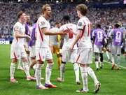 Kane e Gordon comemoram gol da Inglaterra sobre a Argentina Kane e Gordon comemoram gol da Inglaterra sobre a Argentina