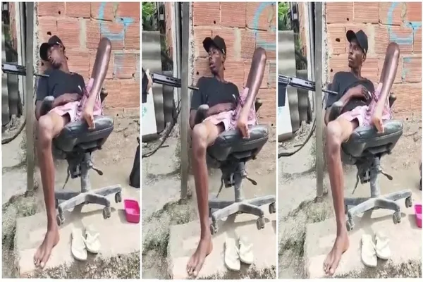 Imagem colorida de PM acordando homem de cochilo - Metrópoles