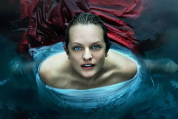 Foto colorida de uma personagem da série The Handmaid's Tale- Metrópoles