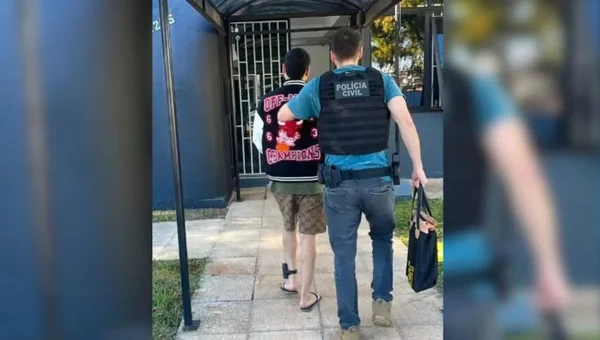 homem sendo preso