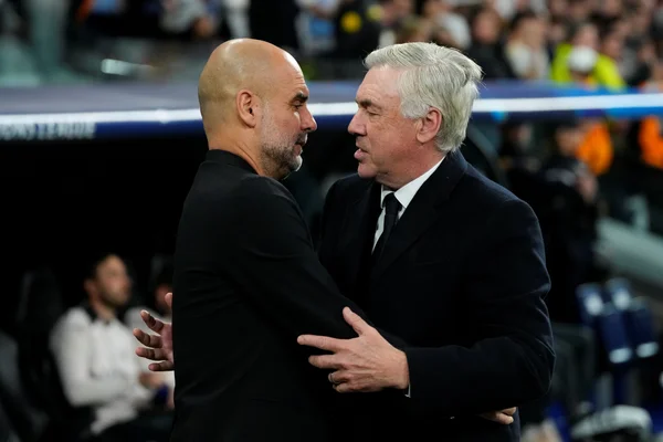 Foto colorida de Ancelotti e Guardiola - Metrópoles