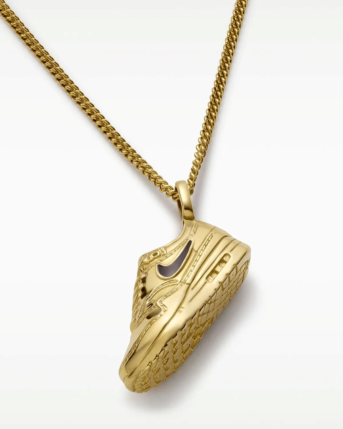 Nike lança primeira coleção própria de joias inspirada no logo Swoosh - imagem 3 Nike lança primeira coleção própria de joias inspirada no logo Swoosh - imagem 3