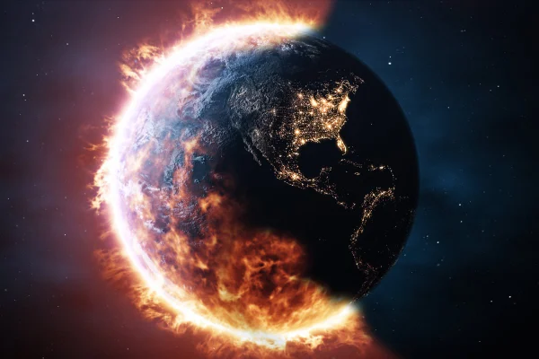 Ilustração do planeta terra com metade pegando fogo - Metrópoles.