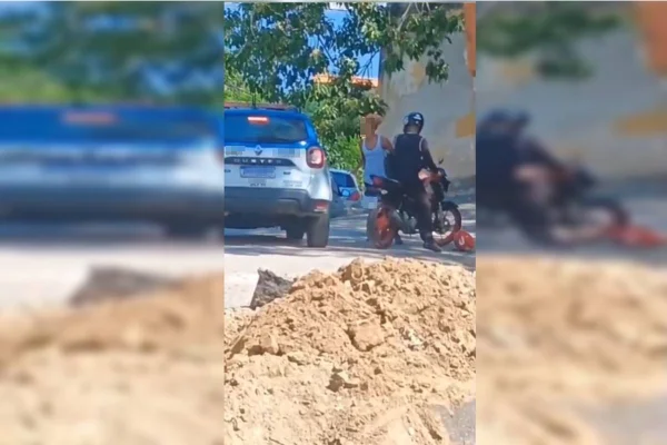 mulher e motociclista