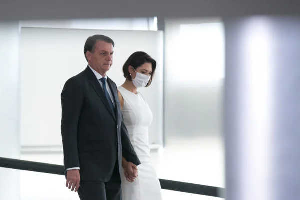Presidente bolsonaro e Michelle bolsonaro durante Posse do novo ministro do turismo, Gilson Machado durante evento no planalto 1