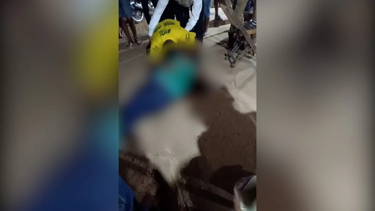 homem caído no chão
