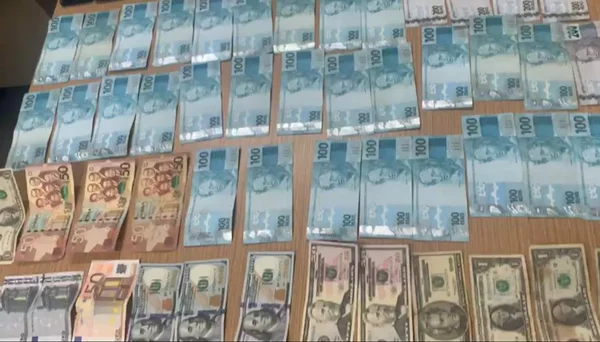 Africano monta banca clandestina e é preso com euro, dólar e celulares