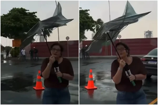 Ventania destrói guarda-chuva de repórter da Globo ao vivo. Assista