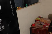 Brinquedos na casa do investigado Brinquedos na casa do investigado
