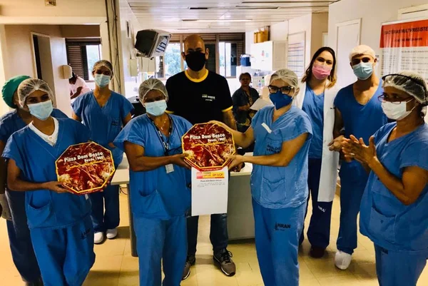 Servidores Hran ganham pizza Dom Bosco