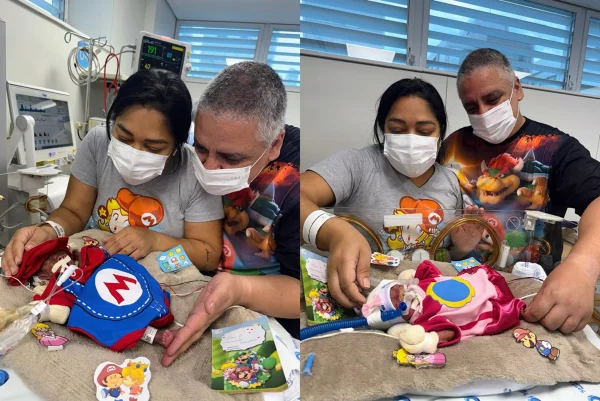 Fotos dos pais Tamiris e Danilo com os bebês, ainda na maternidade, Salvattore e Felicitá. Metrópoles