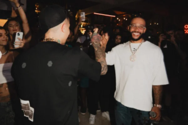 Imagem de Mc Hariel e Memphis Depay - Metrópoles