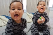 Bebê foi fotografado horas antes de ser assassinado
