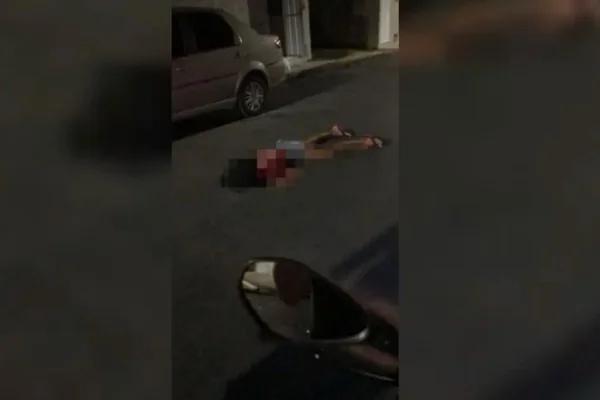 Corpo de mulher em rua - Metrópoles