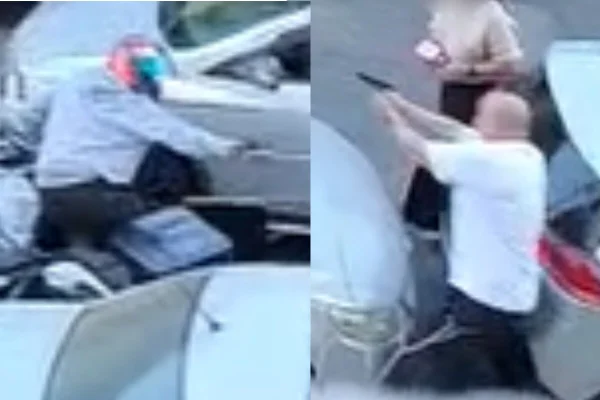 Homem careca aponta arma na rua conta homem de capacete - metrópoles