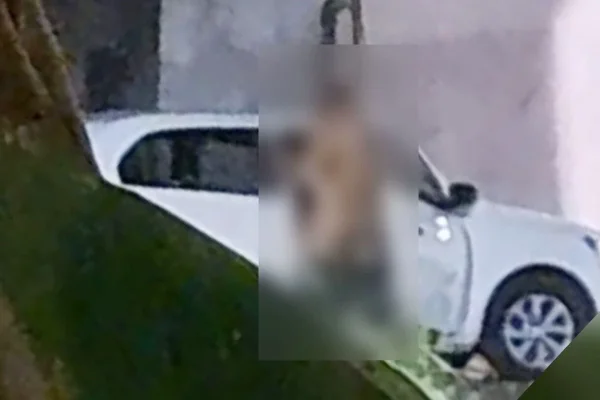 Casal encostado em carro - Metrópoles
