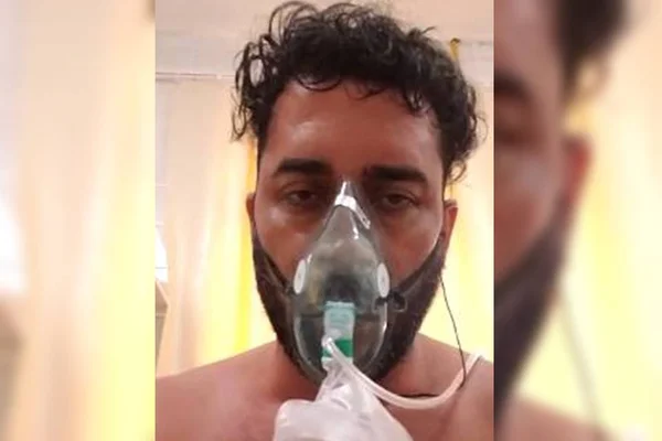 Homem com máscara de oxigênio