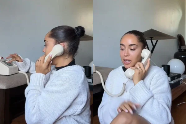 Foto colorida de uma mulher no telefone - Metrópoles
