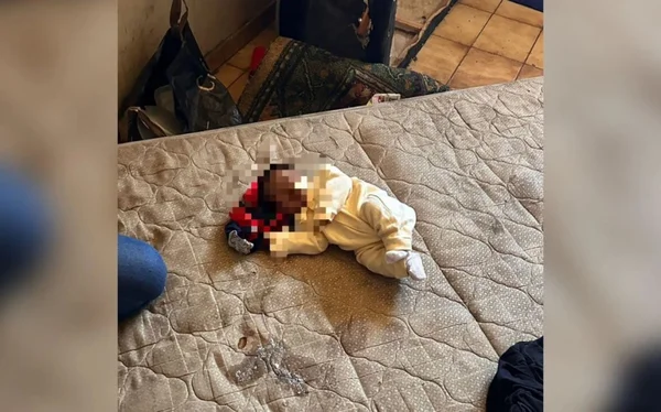 imagem colorida bebe encontrado em boca de fumo