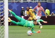Finalização de Semenyo, de Gana, contra a Croácia
