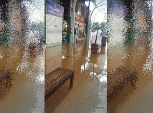 Feira dos Importados fica alagada durante temporal. Vídeos