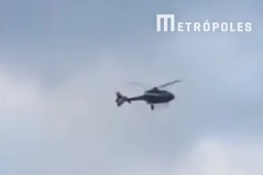 RJ: helicóptero de táxi aéreo é alvo de disparos em comunidade; vídeo