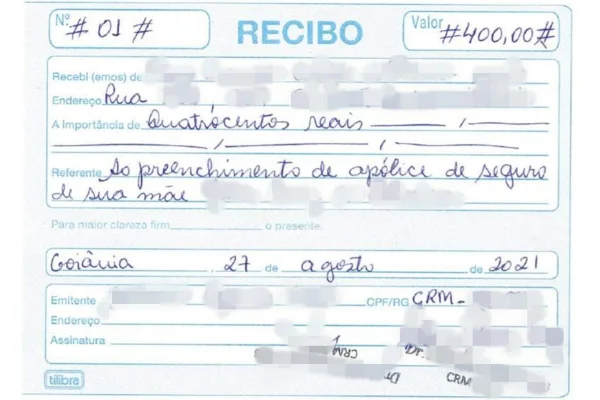 Recibo de pagamento a médico por assinatura em apólice de seguro de paciente morta por câncer em Goiás