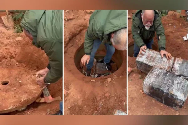 Imagem colorida mostra policial abrindo poço com drogas no interior de SP - Metrópoles
