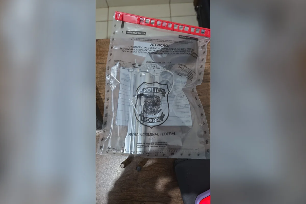 Arma de fogo encontrada com um investigado Arma de fogo encontrada com um investigado