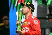 MEXICO CITY, MEXICO - OCTOBER 27: Second placed Sebastian Vettel of Germany and Ferrari celebrates on the podium during the F1 Grand Prix of Mexico at Autodromo Hermanos Rodriguez on October 27, 2019 in Mexico City, Mexico. (Photo by Clive Mason/Getty Images) MEXICO CITY, MEXICO - OCTOBER 27: Second placed Sebastian Vettel of Germany and Ferrari celebrates on the podium during the F1 Grand Prix of Mexico at Autodromo Hermanos Rodriguez on October 27, 2019 in Mexico City, Mexico. (Photo by Clive Mason/Getty Images)