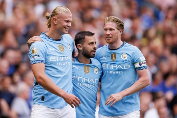 Foto colorida do Haaland, Bernardo Silva e De Bruyne - Metrópoles