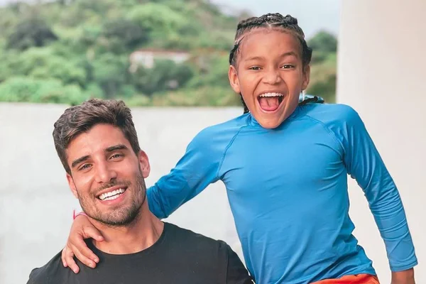 Guilherme Leonel e o filho adotado