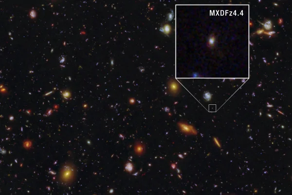 Imagem colorida mostra galáxia primitiva MXDFz4.4 - Metrópoles