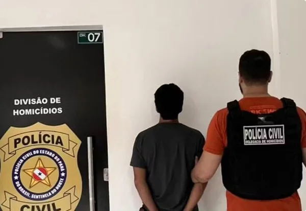 homem sendo preso
