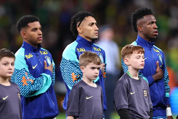 Foto colorida de Raphinha,, Rodrygo e Vini Jr - Metrópoles