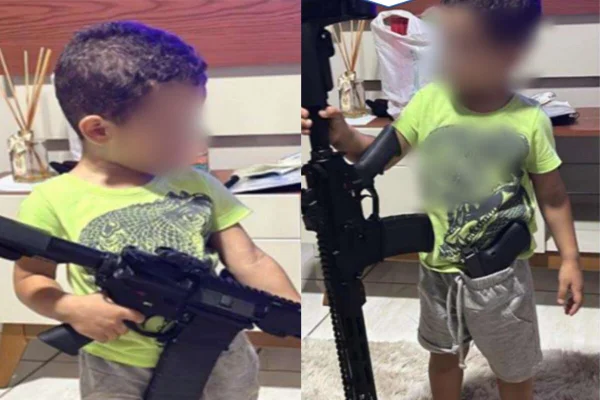 Com 4 anos, filho de traficante rival do PCC posa para fotos com fuzil