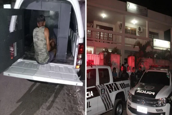 Suspeito preso é levado no carro da polícia