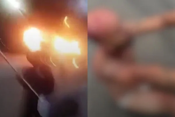Imagens embaçadas de homem caído em chão suplicando e do lado esquerdo dele veículo em chamas - Metrópoles