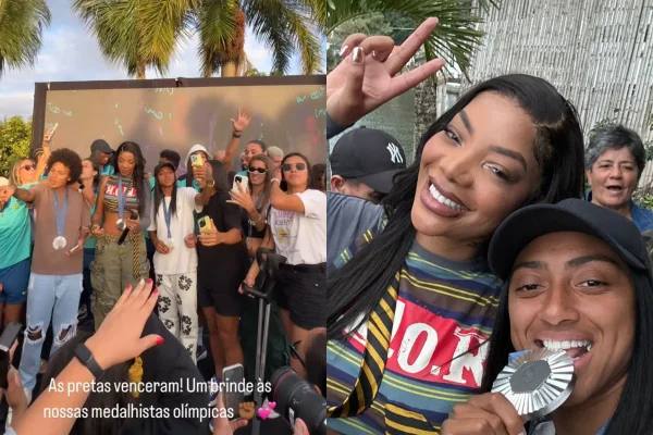 Imagem colorida de Ludmilla com as integrantes da seleção brasileira de futebol feminino