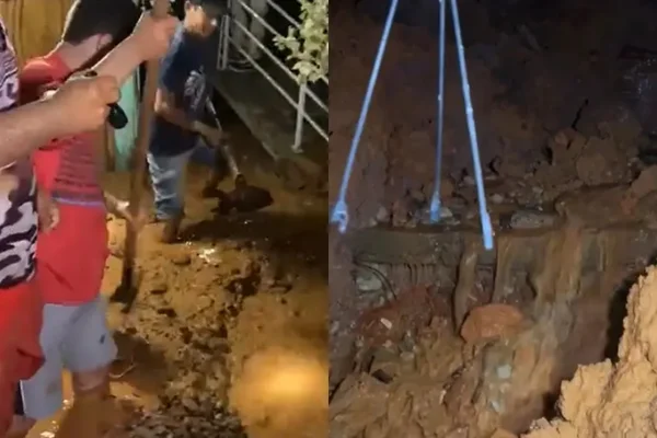 Imagem colorida: homens de perfil olham para lama provocada por cano estourado -Metrópoles