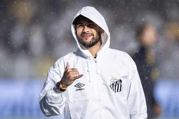 Imagem colorida de Neymar com casaco do Santos - Metrópoles