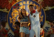 Giullia Bascacio como Suzana, Xamã como Búfalo em Os Donos do Jogo Giullia Bascacio como Suzana, Xamã como Búfalo em Os Donos do Jogo
