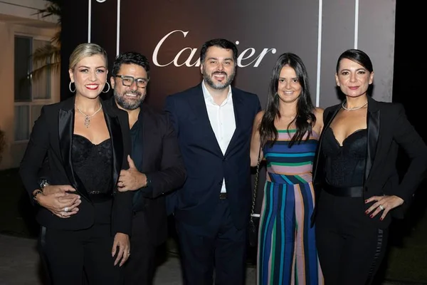 Cartier e Grifith lançam relógio em festa no Lago Sul