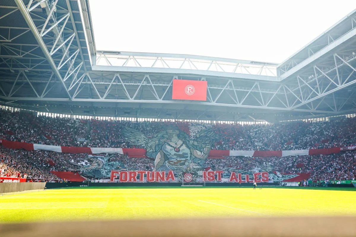 DUESSELDORF, GERMANY - SEPTEMBER 21: Fortuna Düsseldorf fans before the Second Bundesliga match between Fortuna Düsseldorf and 1. FC Köln at Merkur Spiel-Arena on September 21, 2024 in Duesseldorf, Germany. (Photo by Leon Kuegeler/Getty Images) DUESSELDORF, GERMANY - SEPTEMBER 21: Fortuna Düsseldorf fans before the Second Bundesliga match between Fortuna Düsseldorf and 1. FC Köln at Merkur Spiel-Arena on September 21, 2024 in Duesseldorf, Germany. (Photo by Leon Kuegeler/Getty Images)