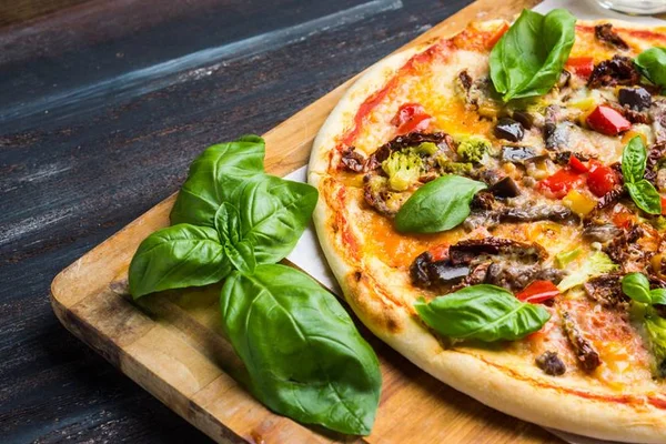 Comemore o Dia da Pizza com cinco fatias deliciosas pela cidade