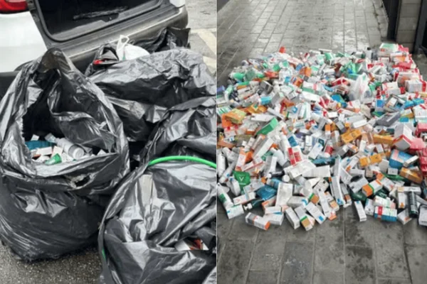 Imagem colorida de sacos pretos repletos de medicamentos furtados por uma quadrilha; um homem foi preso - Metrópoles