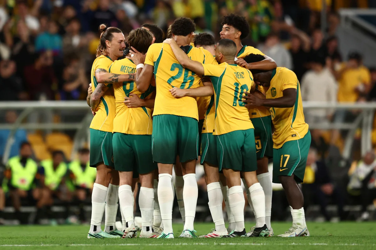 Jogadores da Austrália comemoram segundo gol Jogadores da Austrália comemoram segundo gol
