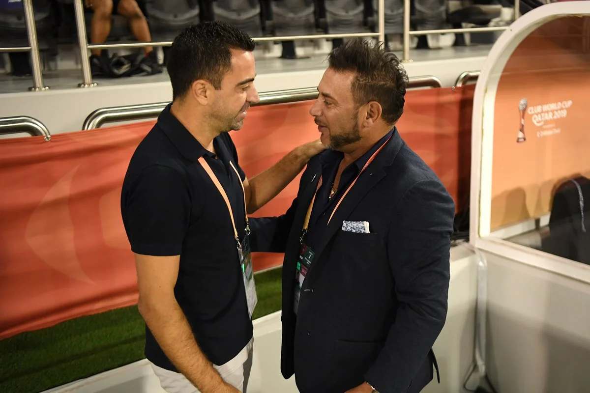 Antonio Mohamed conversando com Xavi durante o Mundial de Clubes Antonio Mohamed conversando com Xavi durante o Mundial de Clubes