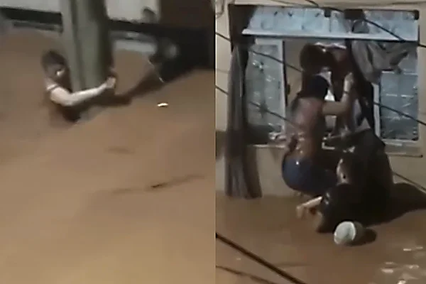 Edna Almeida Silva agarrada ao poste