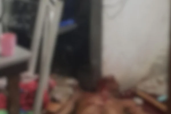 Imagem embaçada do homem encontrado morto golpes facão - Metrópoles